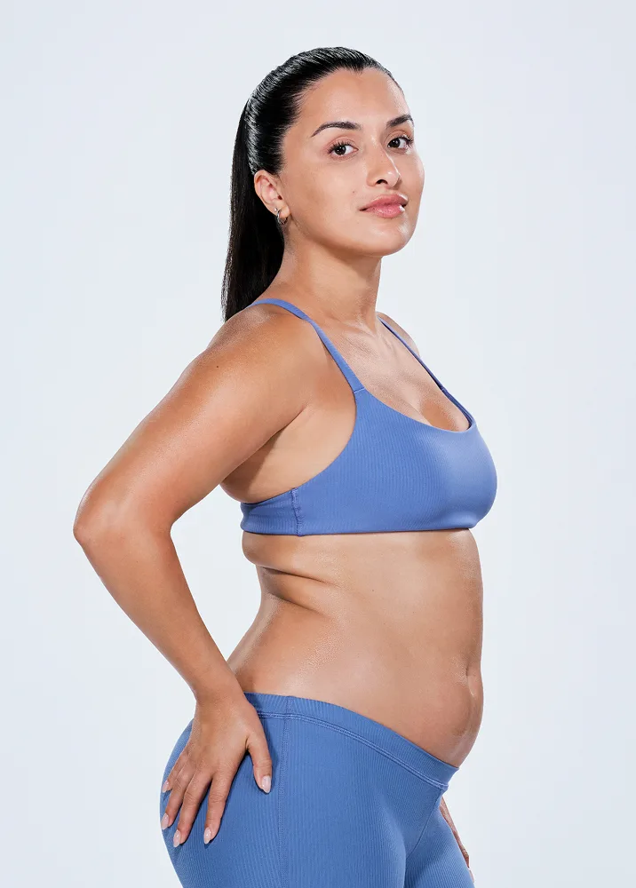 Latina female before CoolSculpting