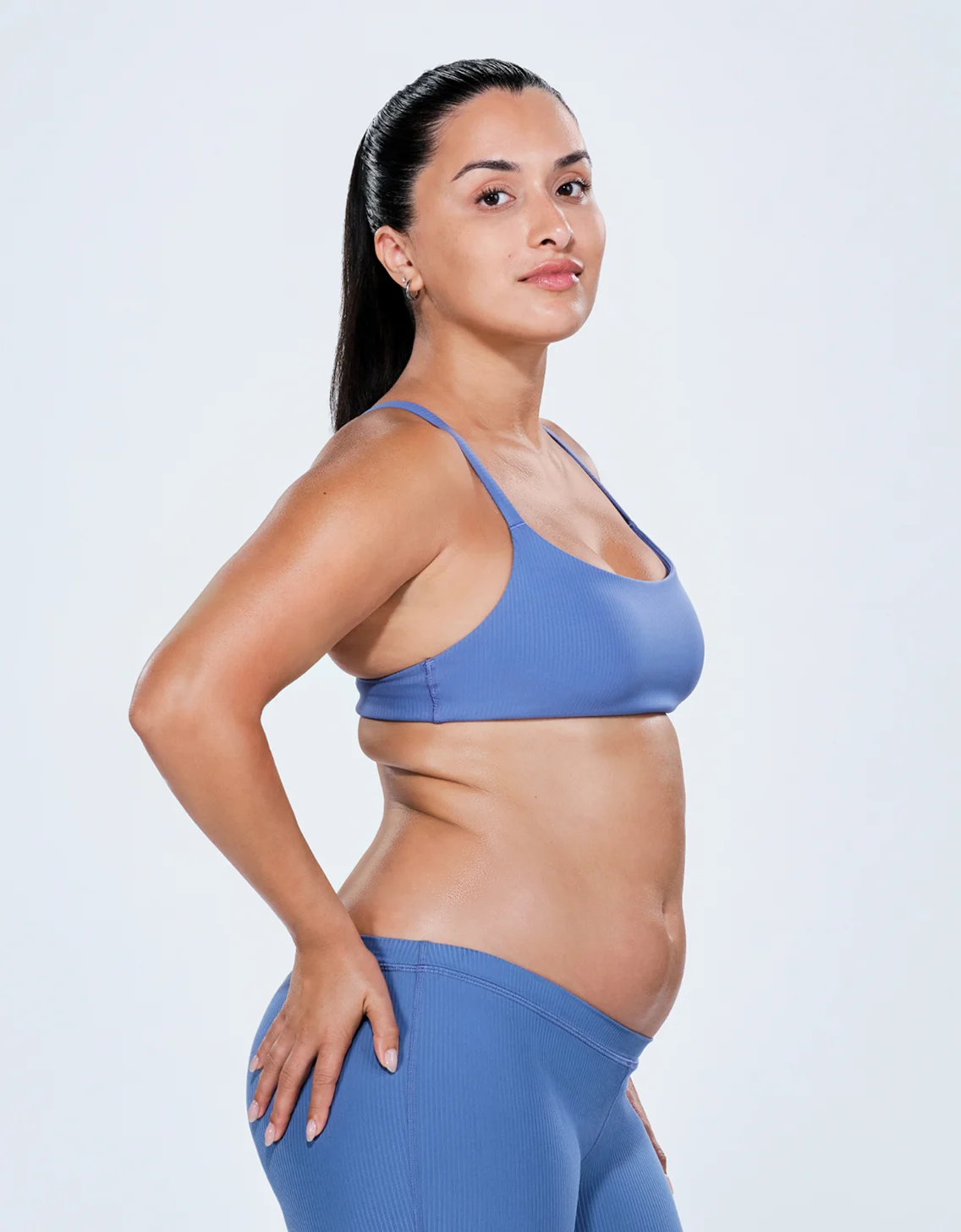 Latina female before CoolSculpting