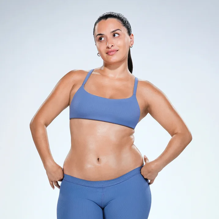 Latina CoolSculpting model showing her results